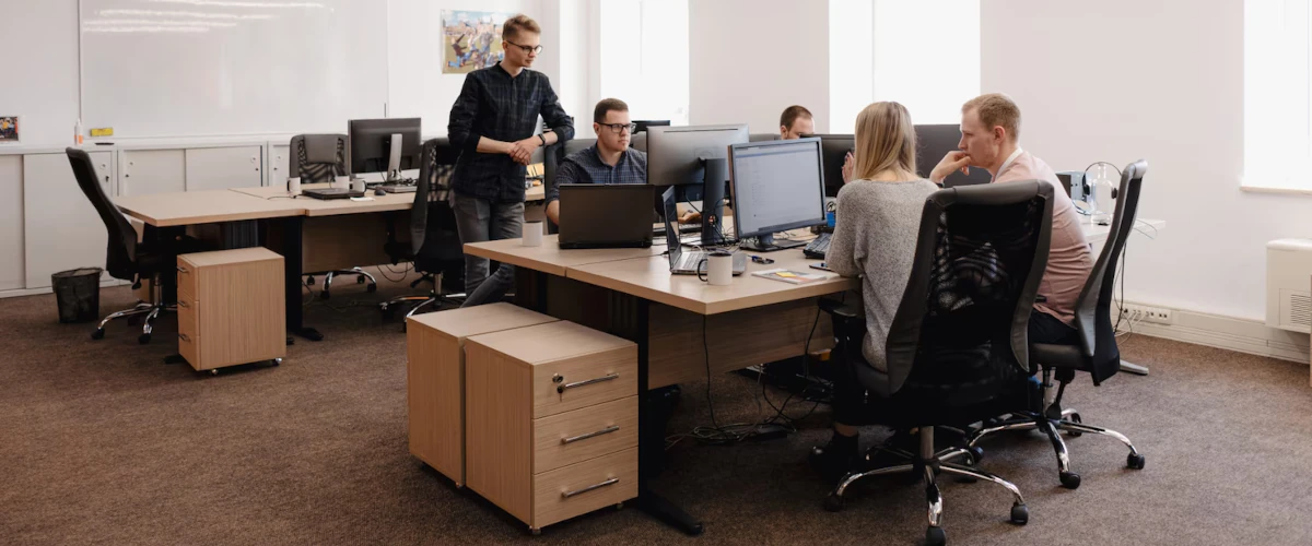 group of young entrepreneurs who work in an office