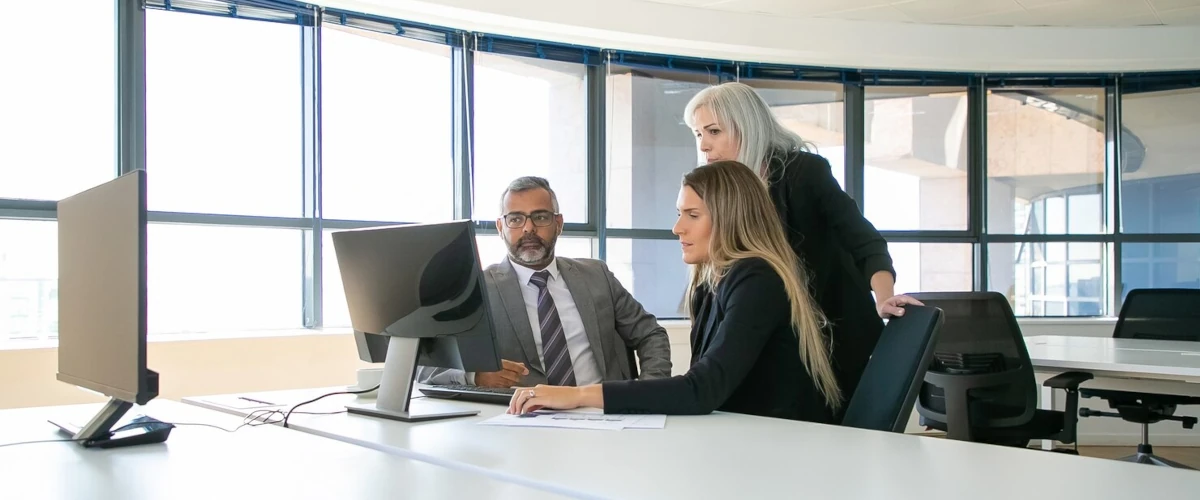 managers working on computer in office